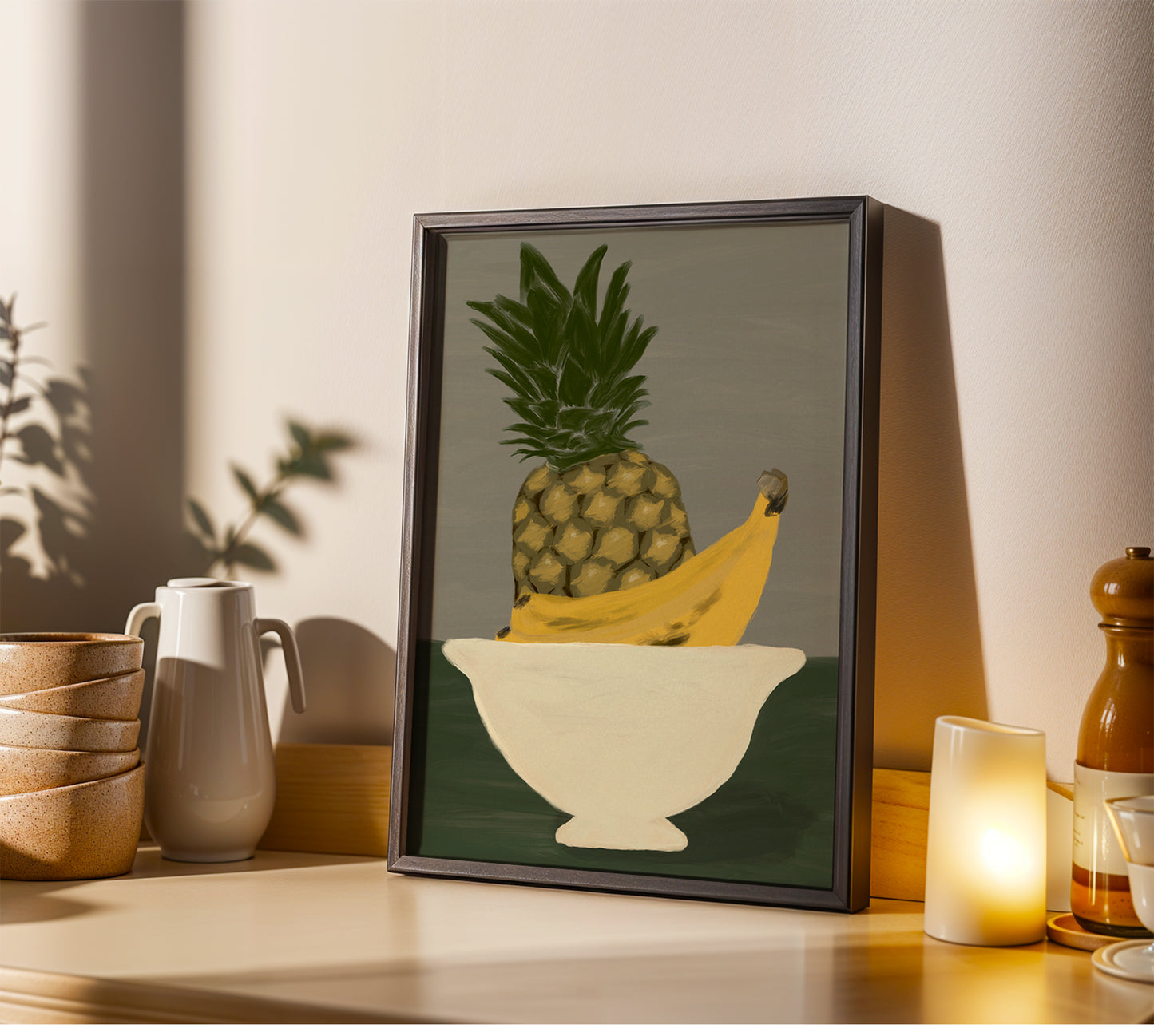 Contemporary kitchen wall art print of pineapple and banana in a bowl, minimalist still life fruit poster for cozy modern interiors.