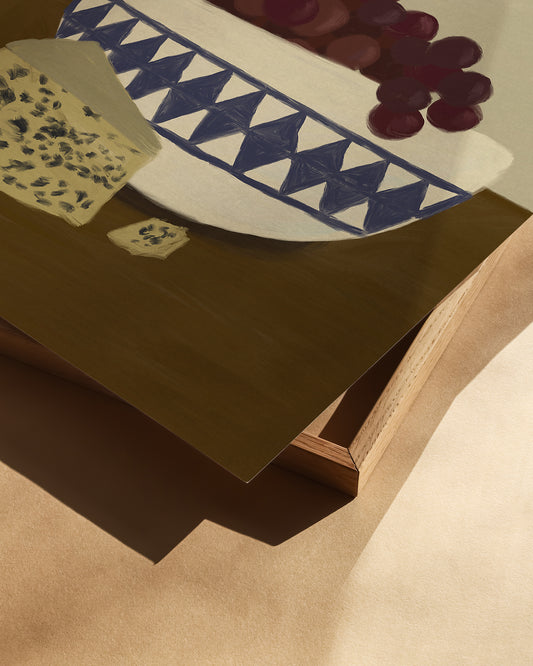 Close-up detail of grapes and cheese art print with patterned bowl, contemporary still life poster for food and kitchen wall art.