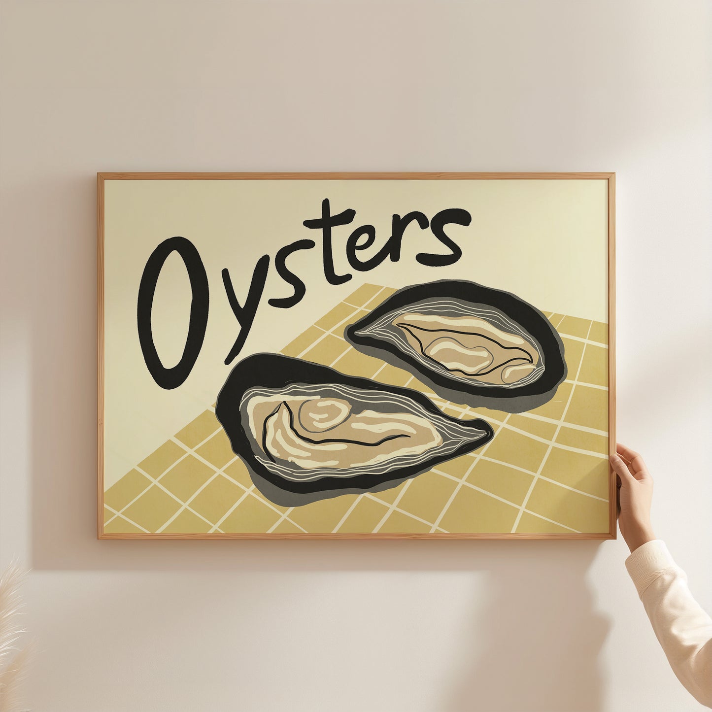 Framed artwork with 'Oysters' text and illustrations on a beige background