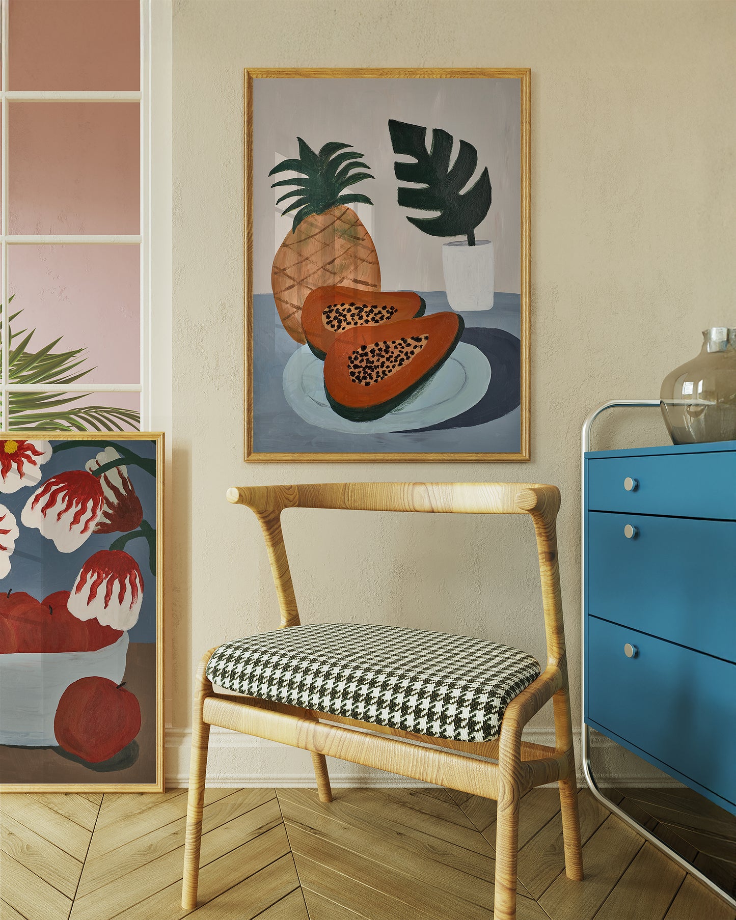 Papaya and pineapple still life art print displayed in a cozy modern interior – tropical wall art for living room or dining area decor.