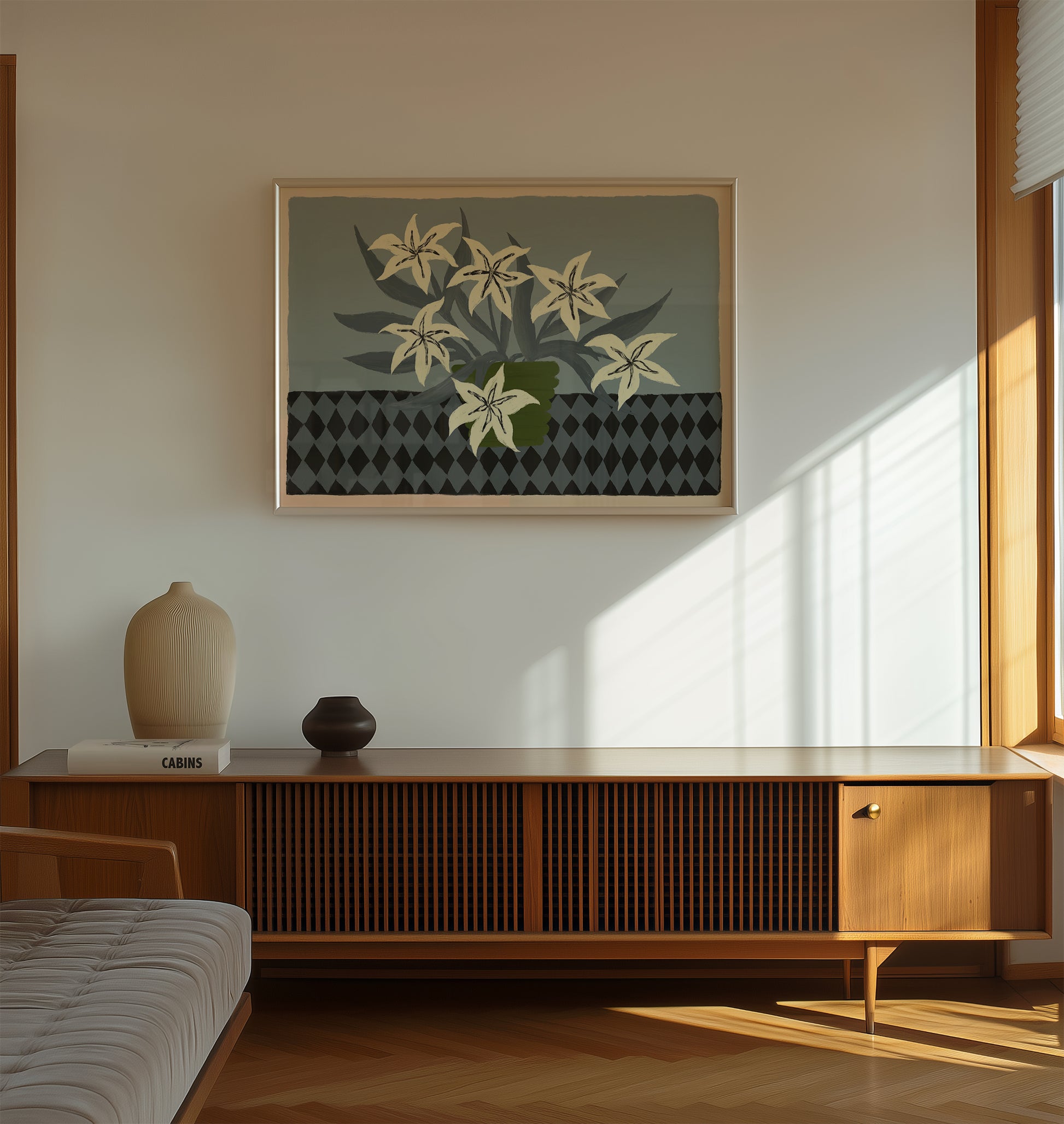 White lilies wall art print in wooden frame, modern botanical still life poster adding floral décor to living room walls.