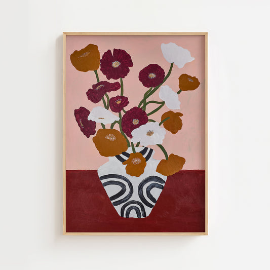 Poppy flower still life acrylic painting art print – modern floral wall art with burgundy, white, and ochre flowers in a patterned vase on a pink background.