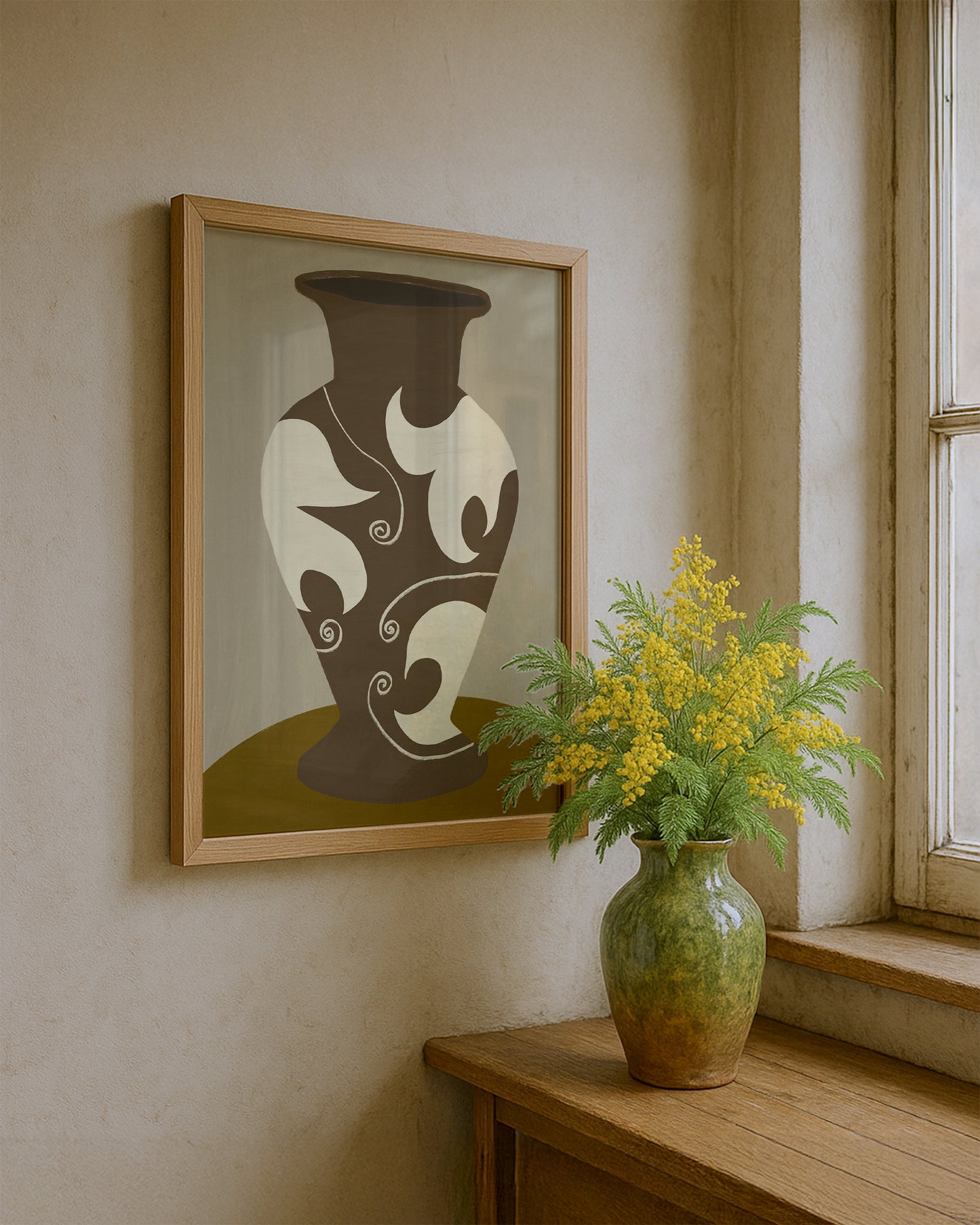 Brown vase wall art print with abstract cream swirl design, framed on a neutral wall beside a window and green ceramic vase with yellow flowers, modern pottery-inspired artwork for stylish home decor.