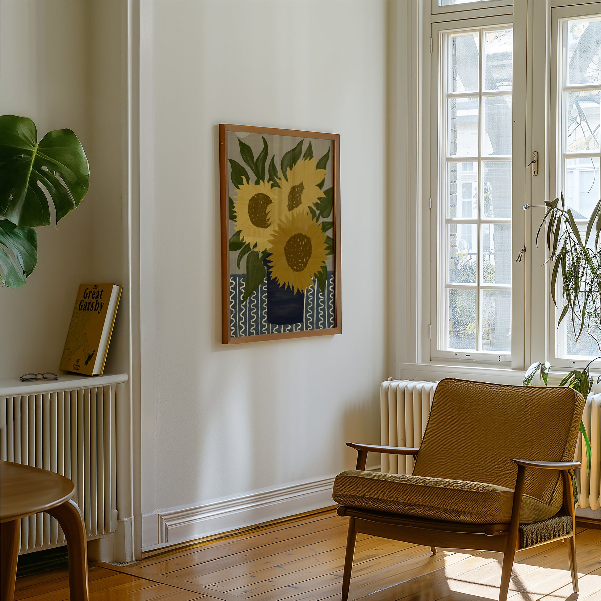 Contemporary sunflower artwork print in a frame, floral wall art poster with bold yellow blossoms, ideal for airy modern or Scandinavian interiors.