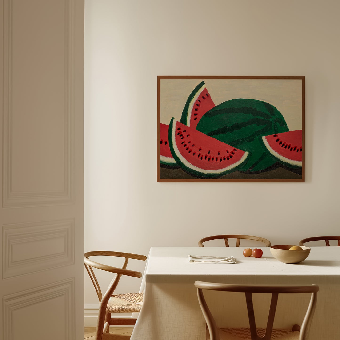Framed watermelon acrylic painting art print hanging above a dining table – modern fruit wall art for kitchen or breakfast area decor.