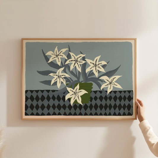 White lilies still life wall art print with bold patterned table, botanical flower poster in wooden frame for modern home décor.